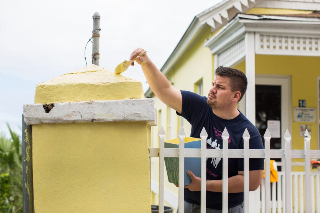 Brock North, of the Rotaract Club of East Nassau and Rotary Club of East Nassau. Rotarians and Rotaractors clean a community center run by the Bahamas AIDS Foundation in Nassau. The Rotary Club of East Nassau organized the project. 16 December 2017.